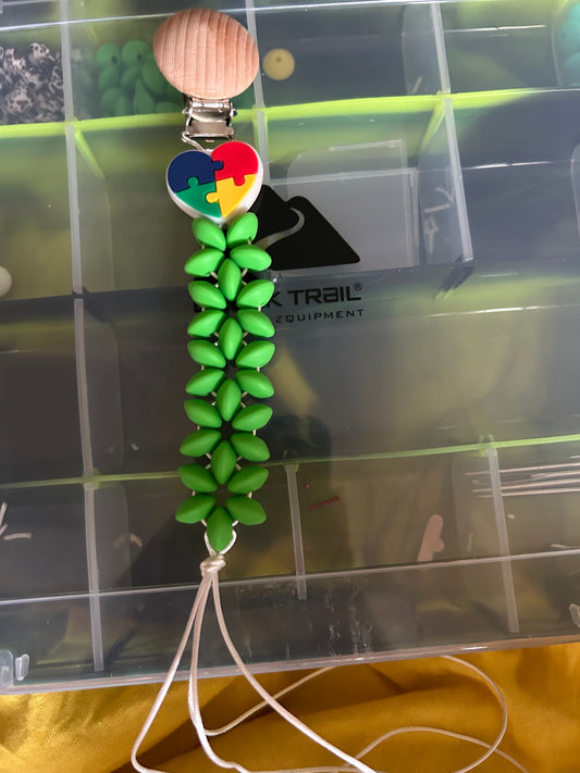 Autism puzzle piece heart pacifier clip