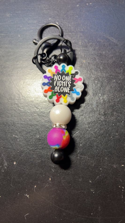 No one fights alone keychain bar