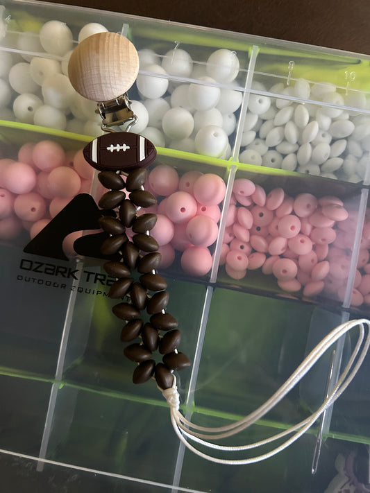 Football pacifier clip