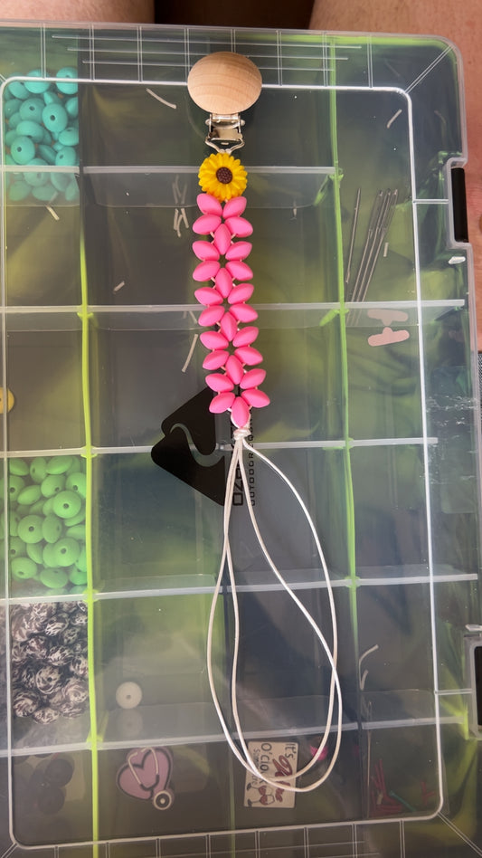 Pink sunflower pacifier clip