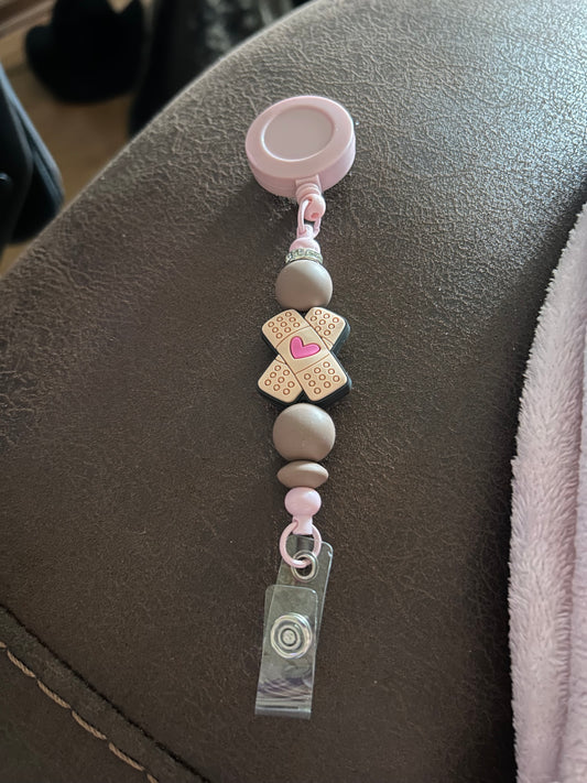 Bandaid Badge Reel