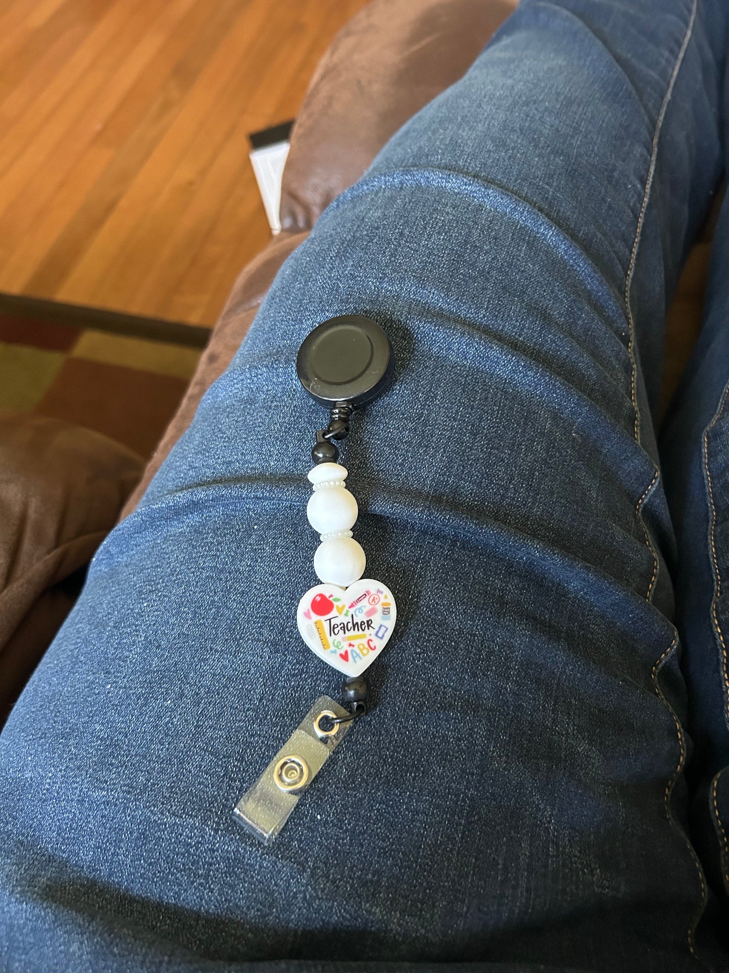 Black Teacher Heart Badge Reel
