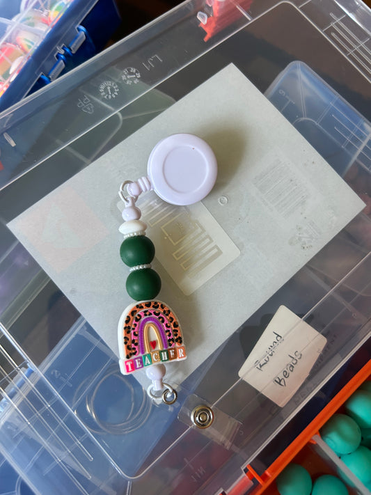 White Teacher Rainbow Badge Reel